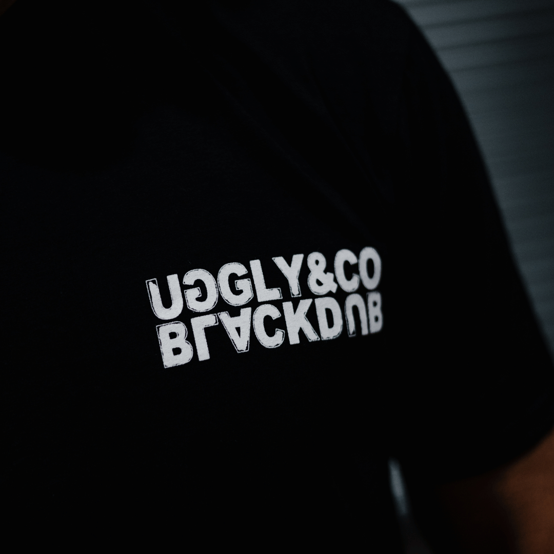 Black Repeat Tee